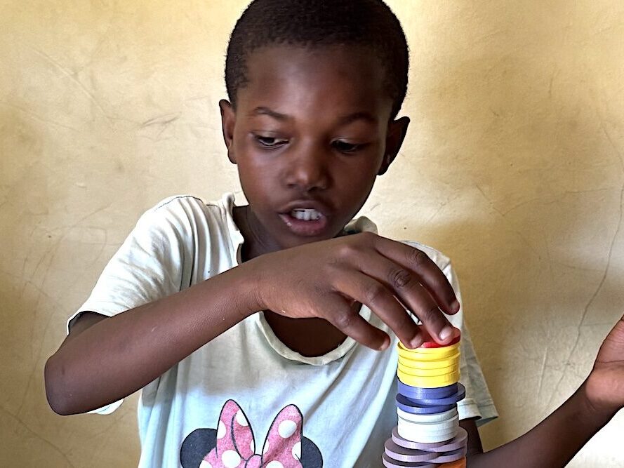 Child playing in TEDS LIBRARY in Korogocho.